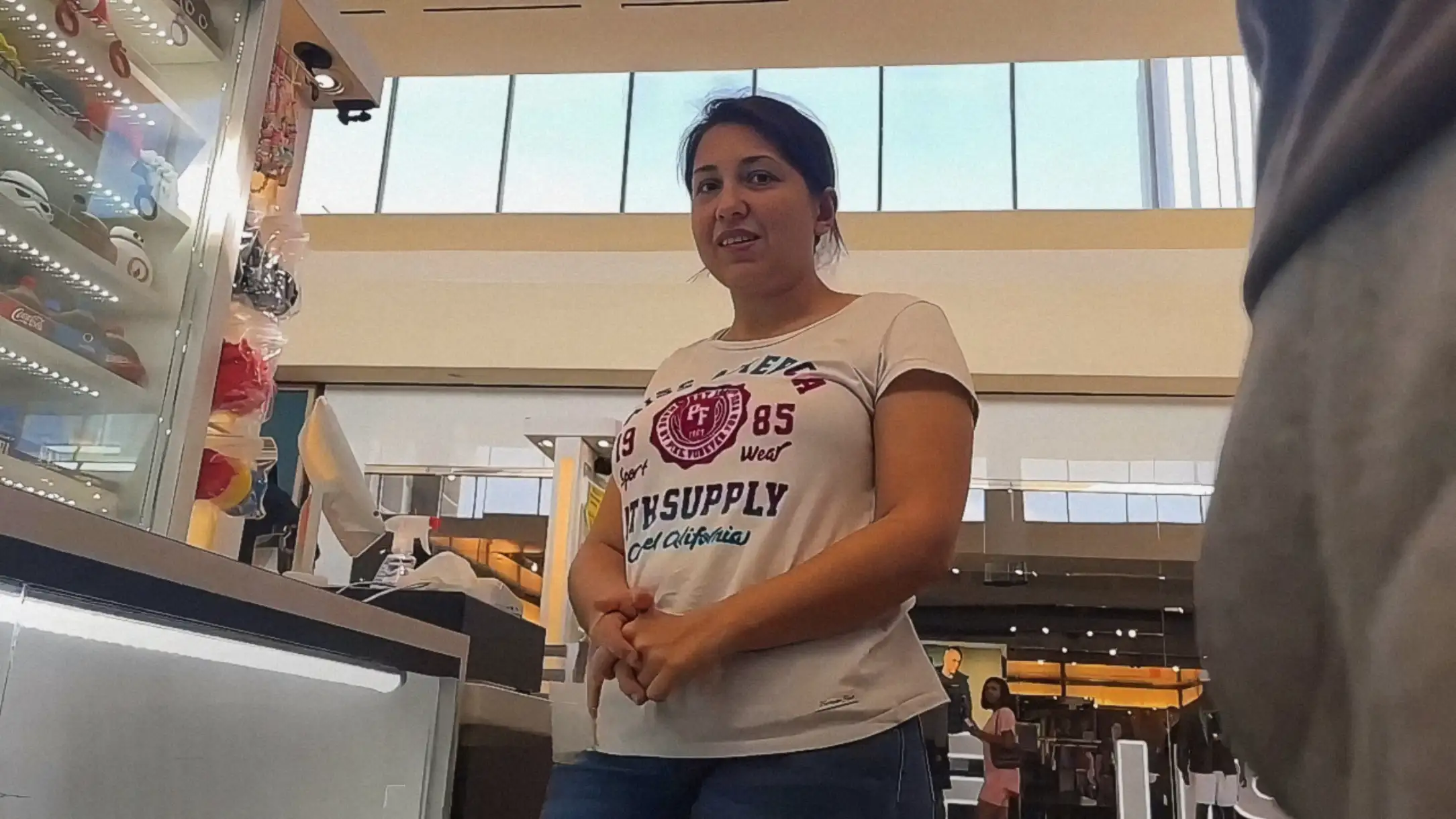 Saleswoman looking bulge flash customer