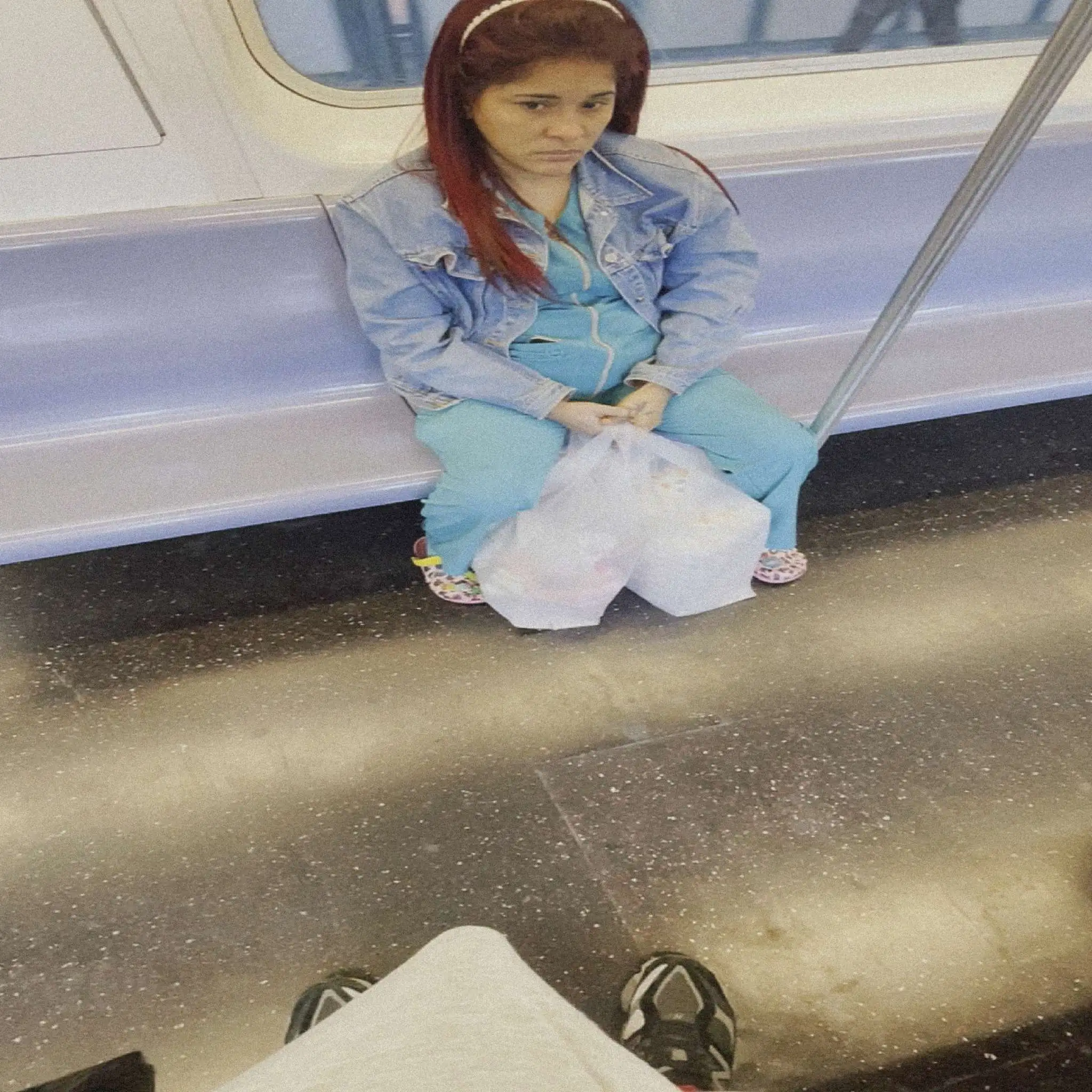 Nurse looking at bulge flash on train